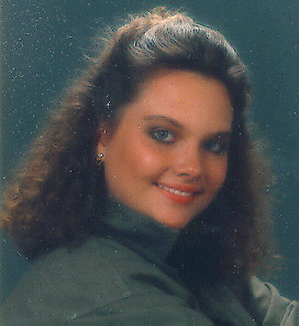 Modeling photo, with makeup and fluffy hair
and all -- very 80's.